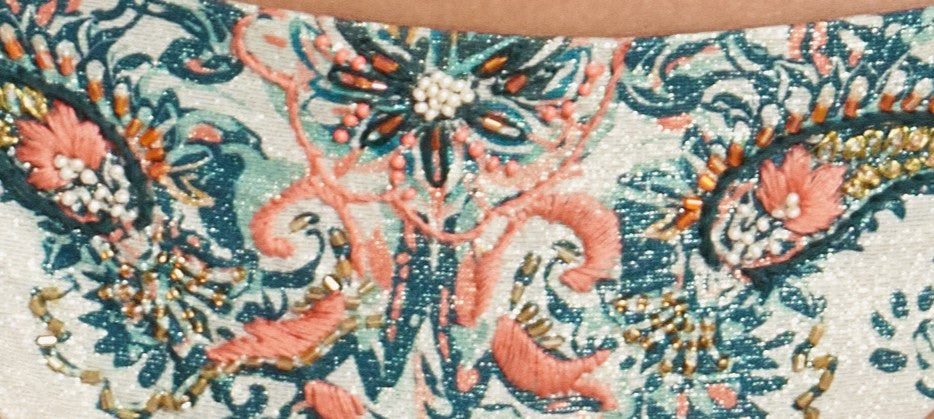 A closer look at the front design of the Azure Tie Side American Bikini Bottom, with hand-made embroidery, with multicolored pattern.